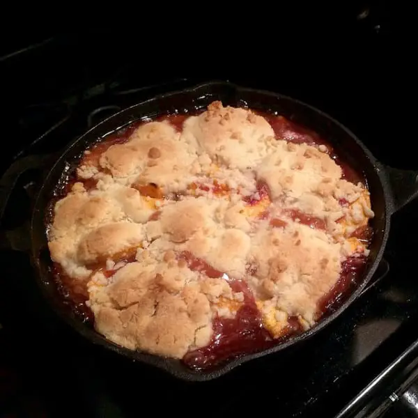 Easy Peach Cobbler Recipe Made with Fresh Peaches - The Sweet, juicy peaches in the filling make this dish disappear so quickly!